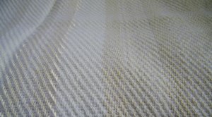 Twill weave showing vertical stripes in white and cream